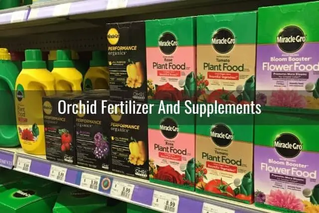 Orchid growing supplies: rows of orchid fertilizer and different supplements in the store