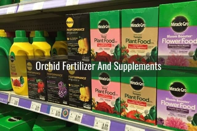 Orchid growing supplies: rows of orchid fertilizer and different supplements in the store