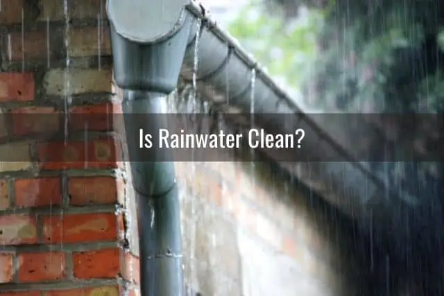 Rain overflowing from gutter during storm